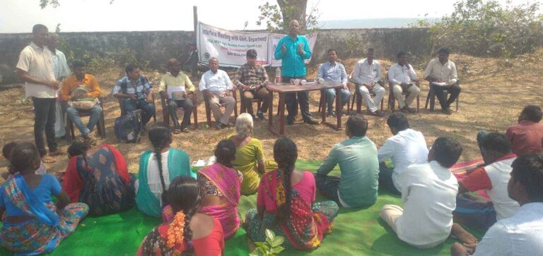 Community meeting with local participants and officials
